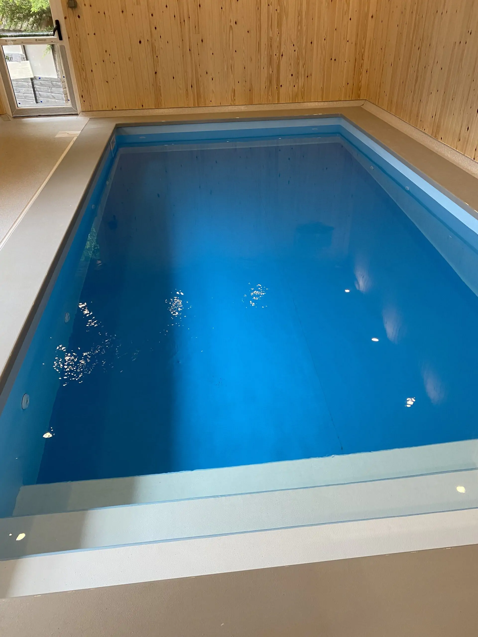 Luxury swimming pool installation in Surrey with energy-efficient heating by Heat Eco.